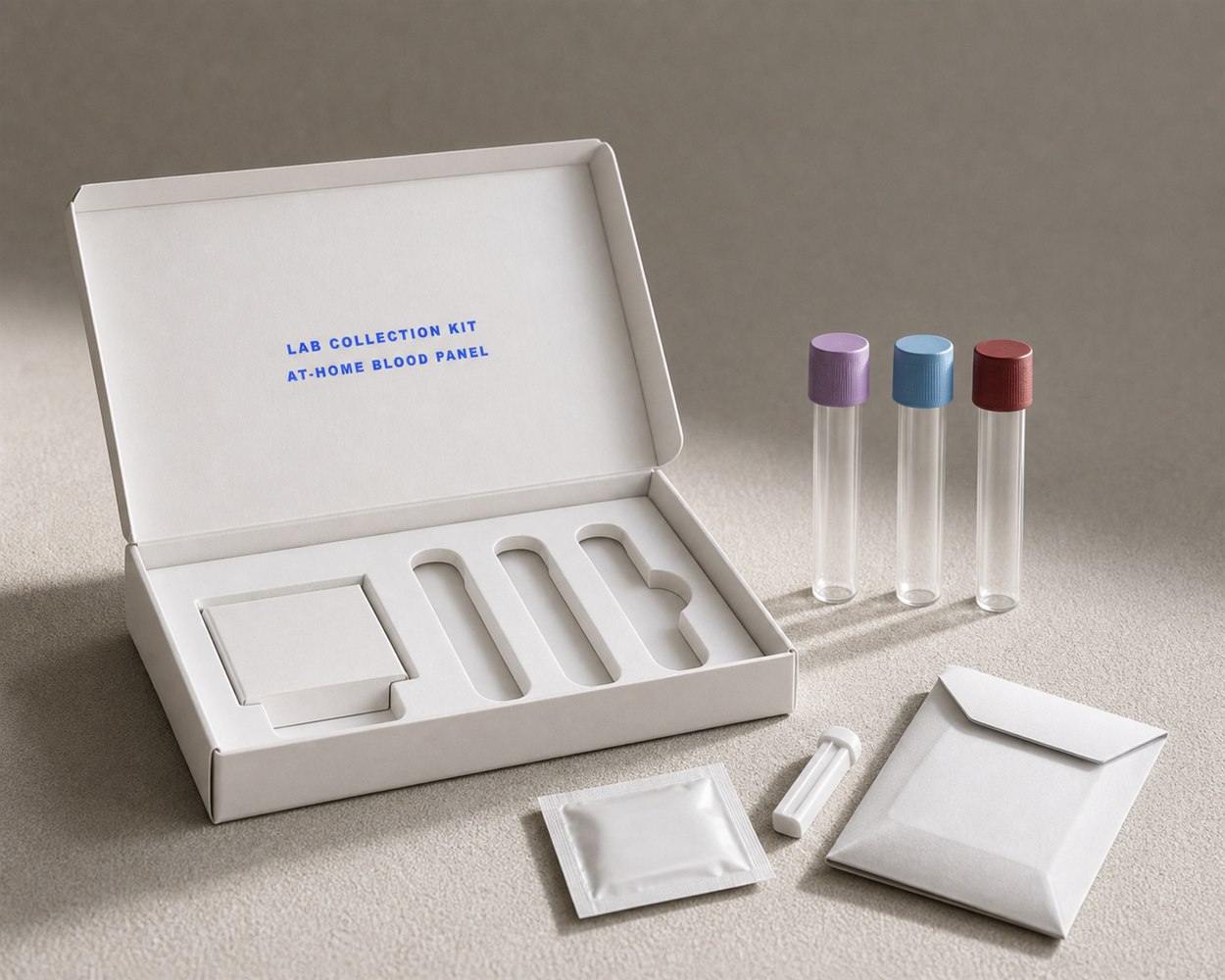 A lab collection kit box with blood collection tubes and a return mailer
